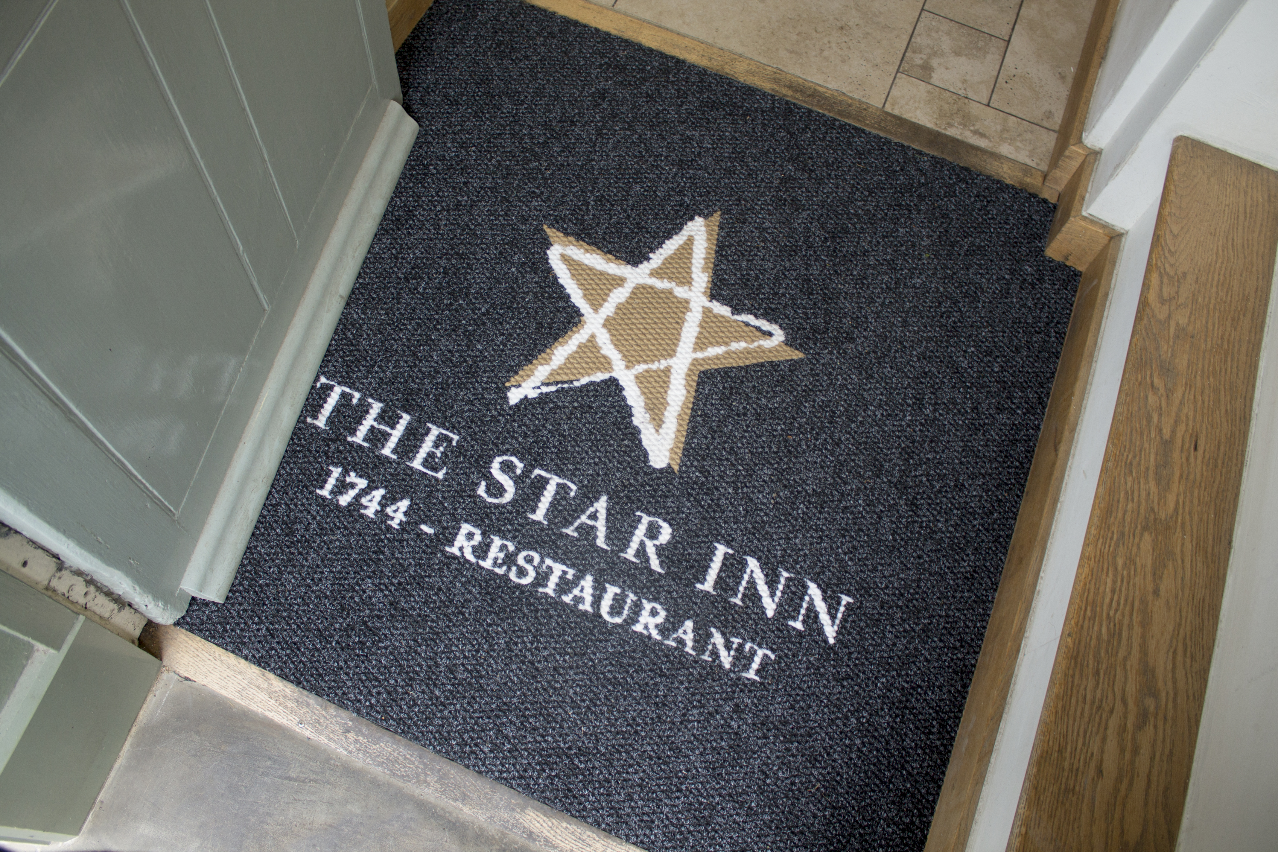 needlepunch Logo Mat